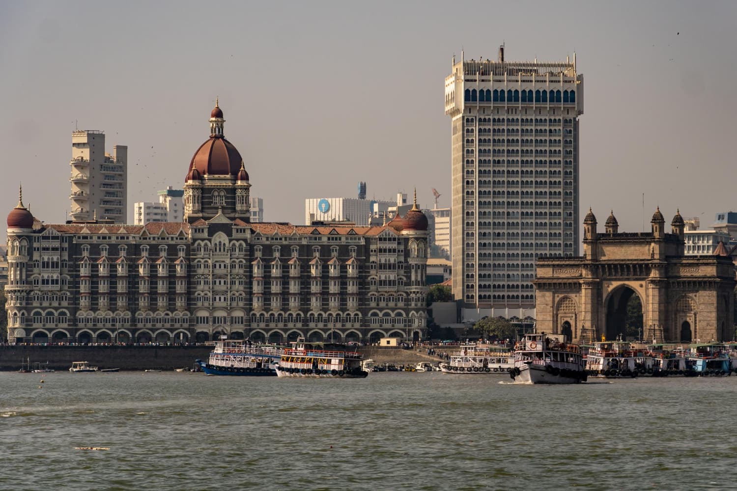 taj hotel at colaba with gateway of india in foreground