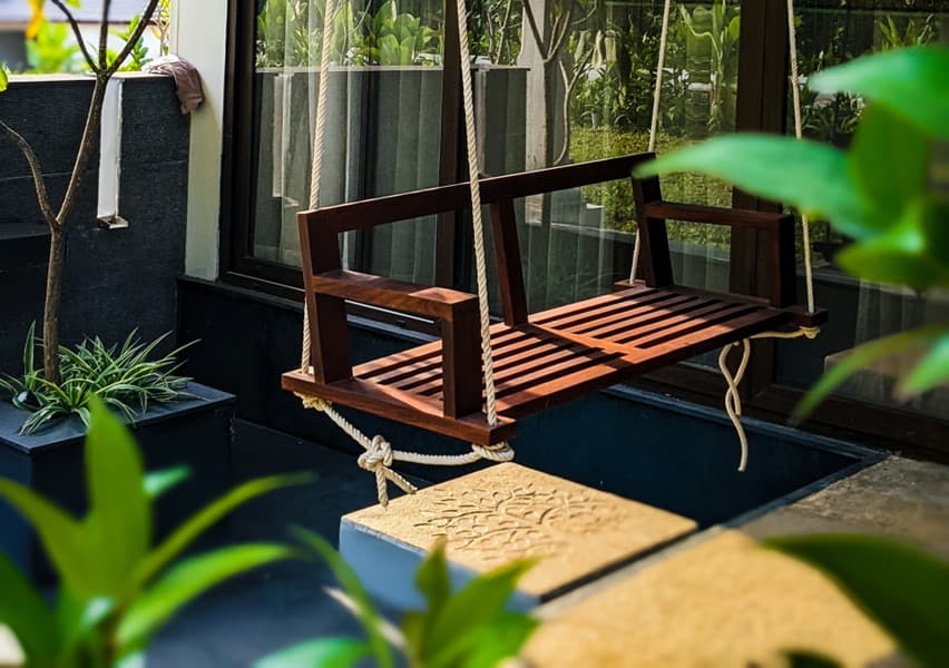 wooden swing in verandah