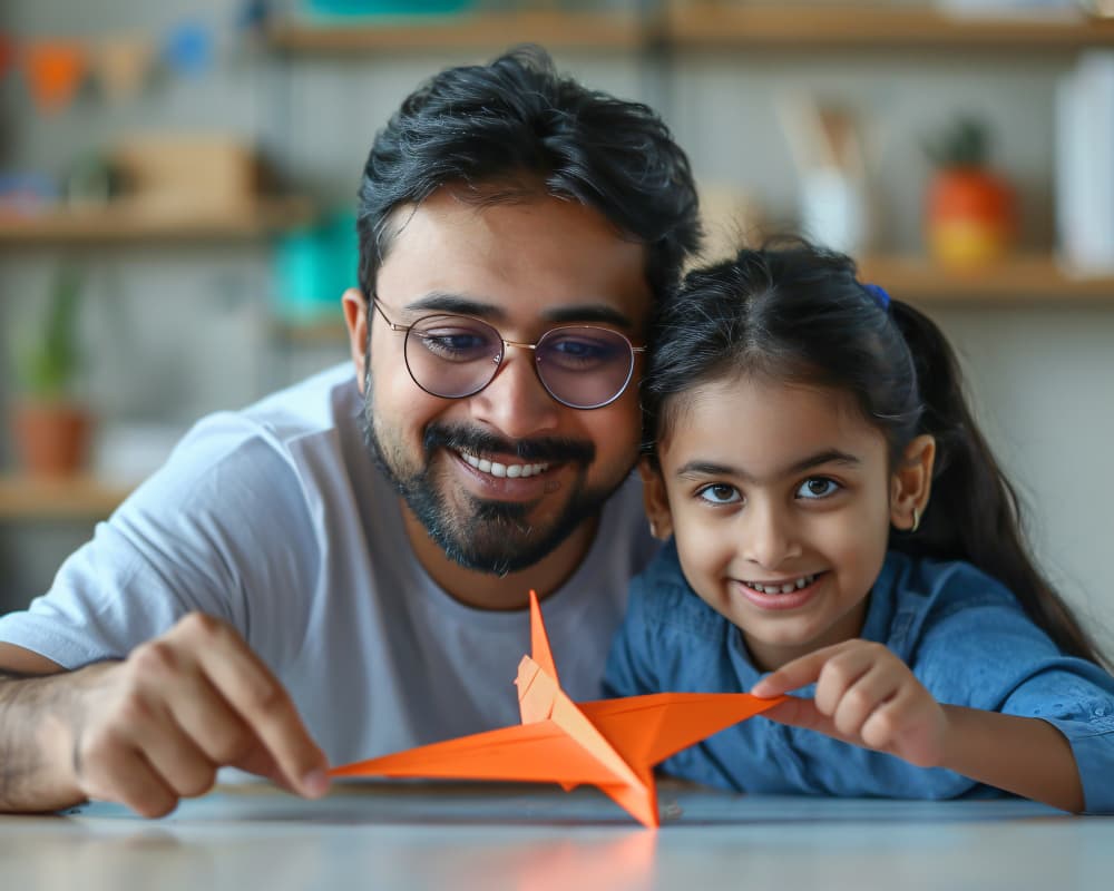 Real Estate Advisor in Navi Mumbai father and daughter playing in home